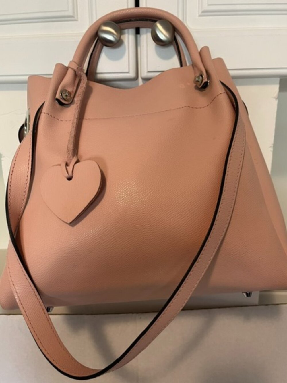 Blush pink leather tote bag.